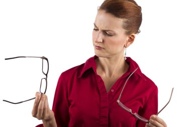 Woman choosing eyeglasses clipart