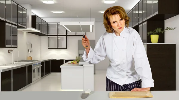 Ženské kuchař v komerční kuchyně — Stock fotografie