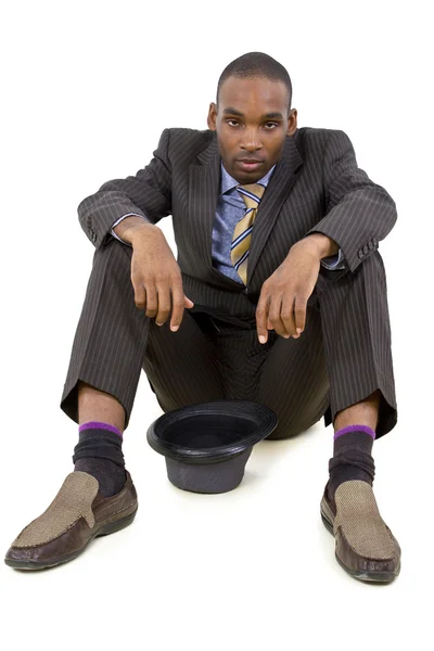 Depressed  businessman sitting in corner — Stock Photo, Image