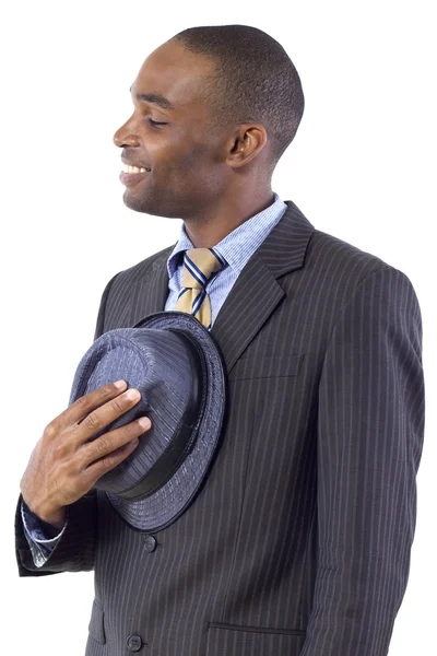 Чёрный бизнесмен снимает шляпу — стоковое фото