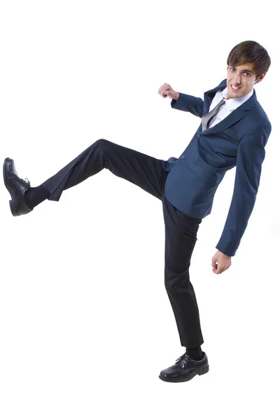 Businessman kicking pose — Stock Photo, Image