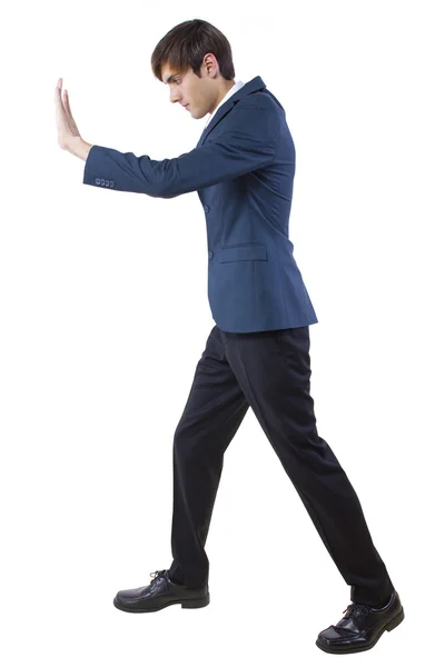 Businessman pushing forward or defending — Stock Photo, Image
