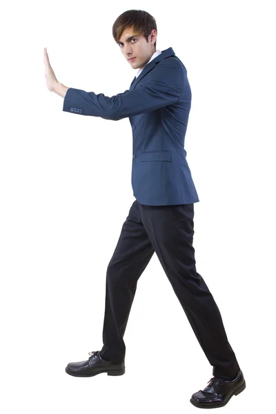 Businessman pushing forward or defending — Stock Photo, Image