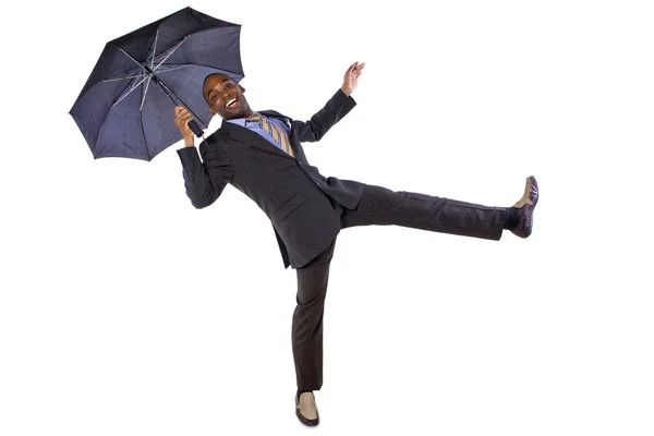 Empresário dançando com um guarda-chuva — Fotografia de Stock