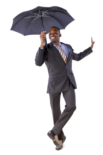 Businessman dancing with an umbrella — Stock Photo, Image