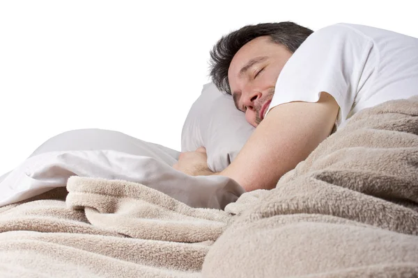Homem dormindo em um quarto — Fotografia de Stock
