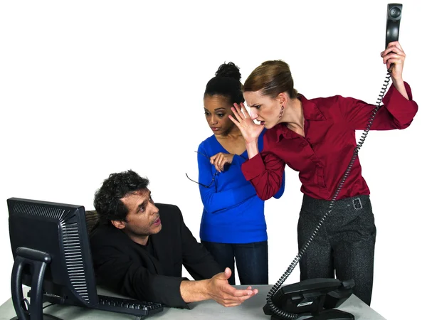 Female employees blaming male co worker — Stock Photo, Image
