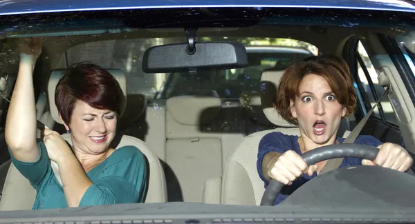 Driver and passenger in a car — Stock Photo, Image