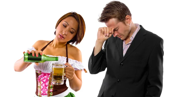 Woman in St Patty's costume serving customers — Stock Photo, Image