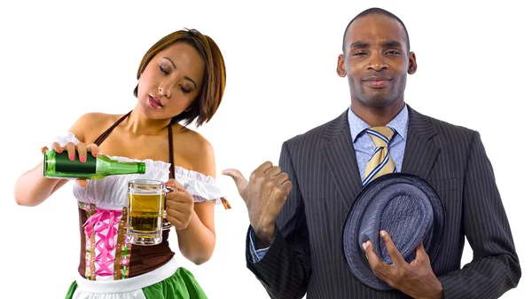 Woman in St Patty's costume serving customers — Stock Photo, Image