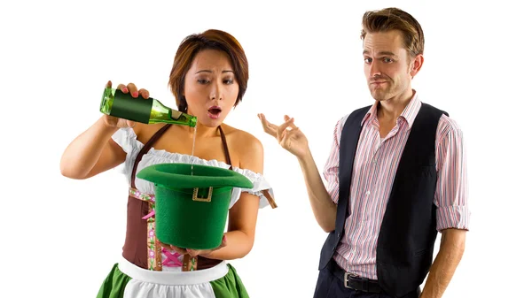 Woman in St Patty's costume serving customers — Stock Photo, Image