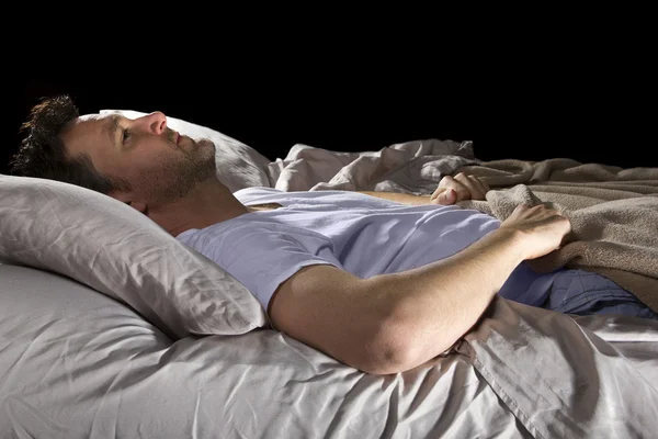 Insomniac unable to sleep in bed — Stock Photo, Image