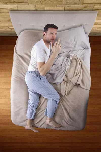 Bedroom with insomniac man unable to sleep — Stock Photo, Image