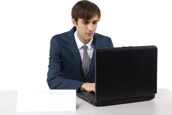 Panneau de bureau vierge sur le bureau de l'homme d'affaires Images De Stock Libres De Droits