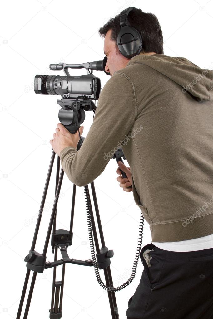 Camera operator with tripod