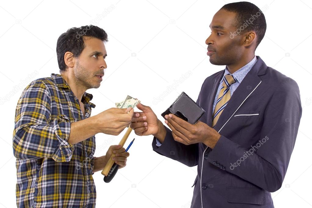 Businessman paying hired blue collar laborer for services
