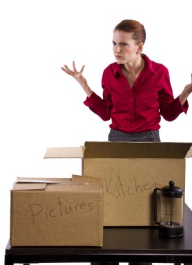 Woman stressed out and packing stuff clipart