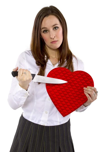 Ex-girlfriend with a heart and knife — Stock Photo, Image