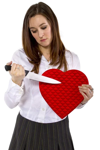 Ex-girlfriend with a heart and knife — Stock Photo, Image