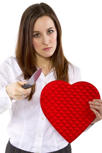 Ex-girlfriend with a heart and knife — Stock Photo, Image