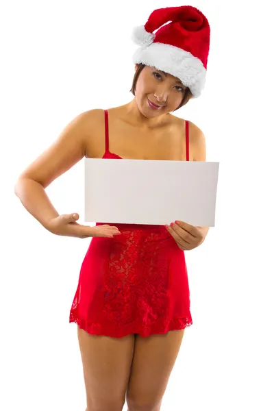 Noel Baba şapkası giyen sexy Asyalı kadın — Stok fotoğraf