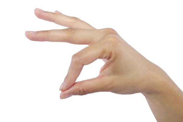 Vrouwelijke hand oppakken van iets onzichtbaar — Stockfoto