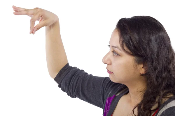 Mão feminina pegando algo invisível — Fotografia de Stock