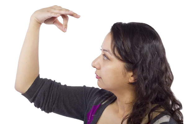 Vrouwelijke hand oppakken van iets onzichtbaar — Stockfoto