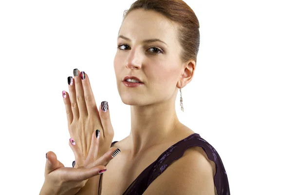 Modelo femenino mostrando arte de uñas —  Fotos de Stock