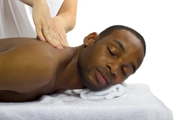 Female masseuse treating male client — Stock Photo, Image