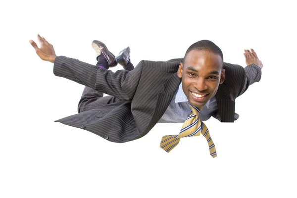 African american businessman flying — Stock Photo, Image