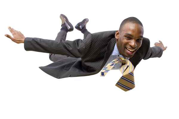 Empresário afro-americano voando — Fotografia de Stock