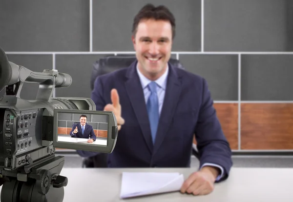 Camera recording male reporter — Stock Photo, Image