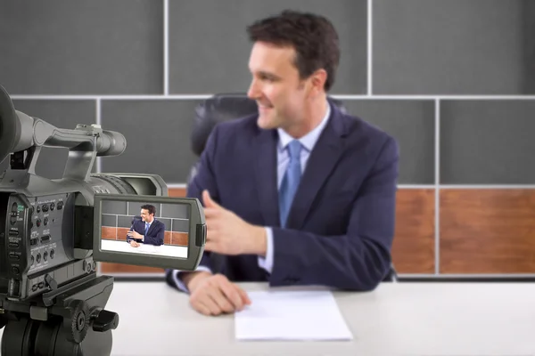 Camera recording male reporter — Stock Photo, Image