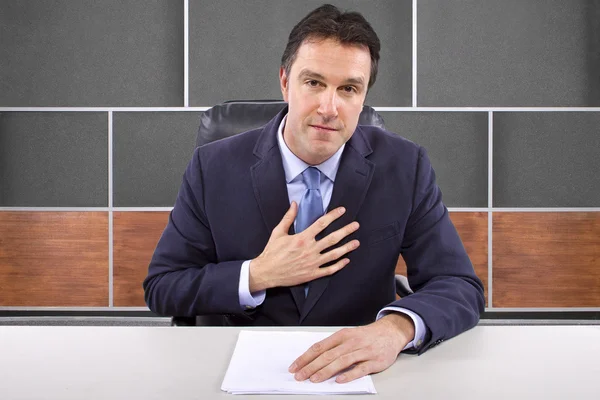 Male news anchor in studio — Stock Photo, Image