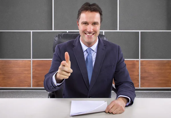 Male news anchor in studio — Stock Photo, Image