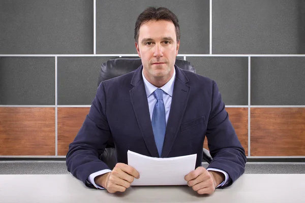 Male news anchor in studio — Stock Photo, Image