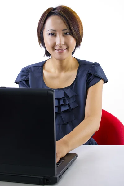 Asian female browsing internet — Stock Photo, Image