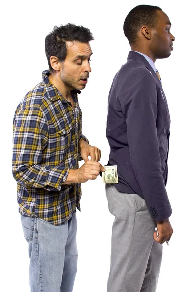Homem a roubar dinheiro da vítima — Fotografia de Stock