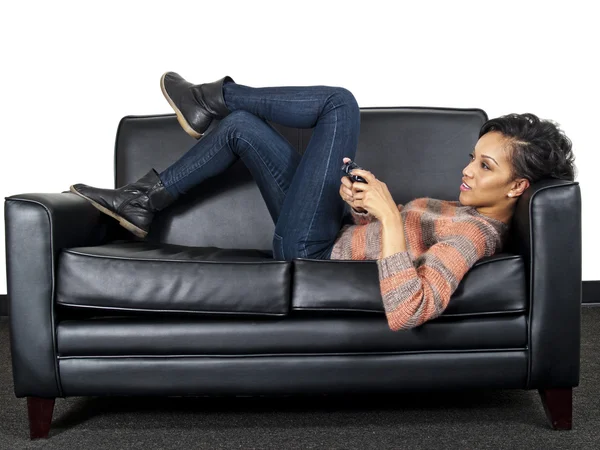 Woman is playing video game — Stock Photo, Image