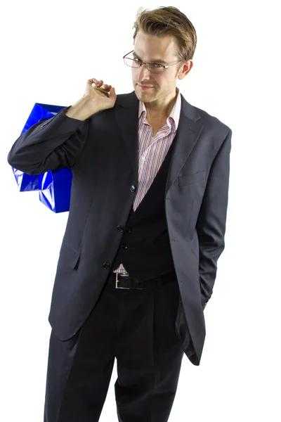 Hombre posando con bolsas de compras — Foto de Stock