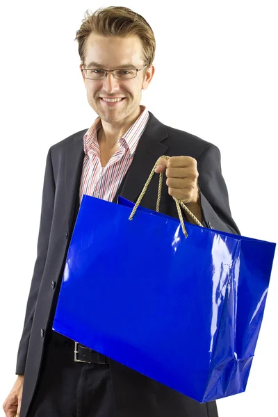 Homme posant avec des sacs à provisions — Photo