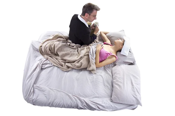 Father taking care of sick daughter — Stock Photo, Image