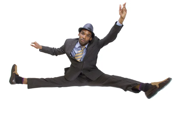 Man in suit doing splits — Stock Photo, Image