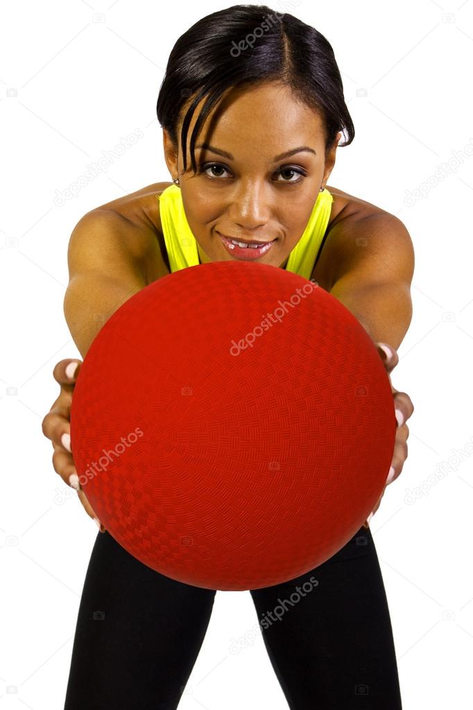Woman with a dodgeball Stock Photo by ©innovatedcaptures 49310431