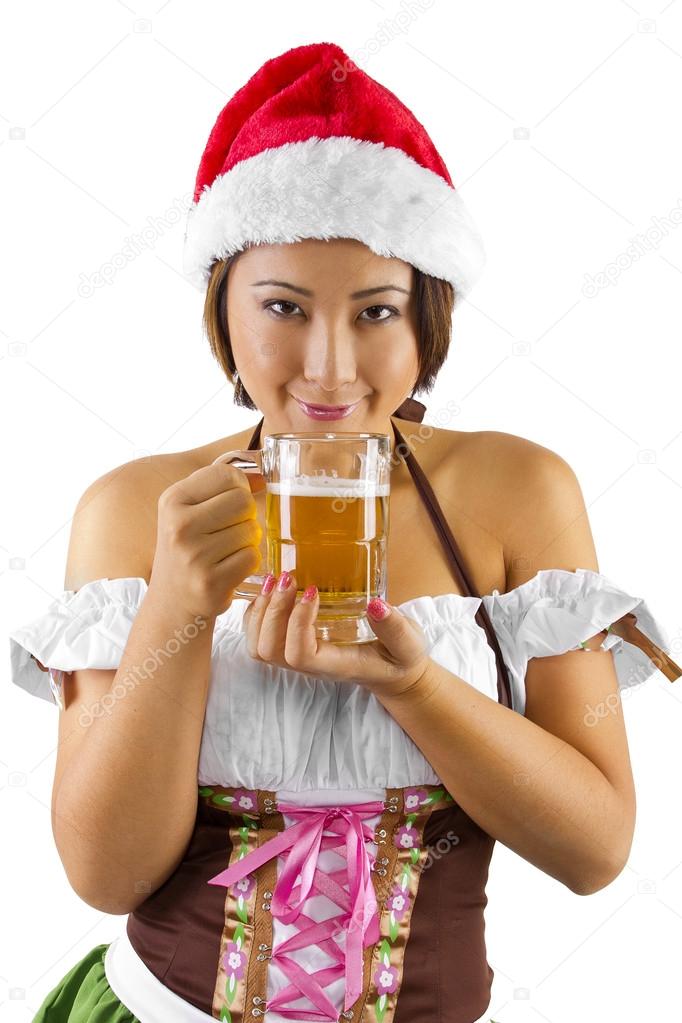 Female bartender holding glass of beer