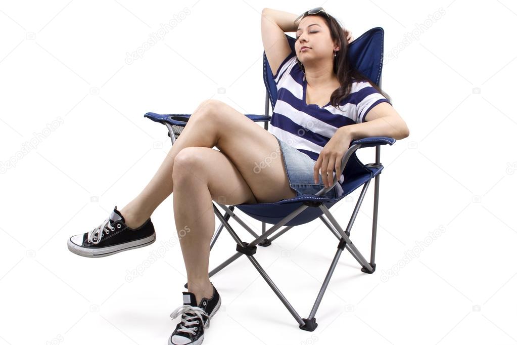 Female relaxing on a beach chair