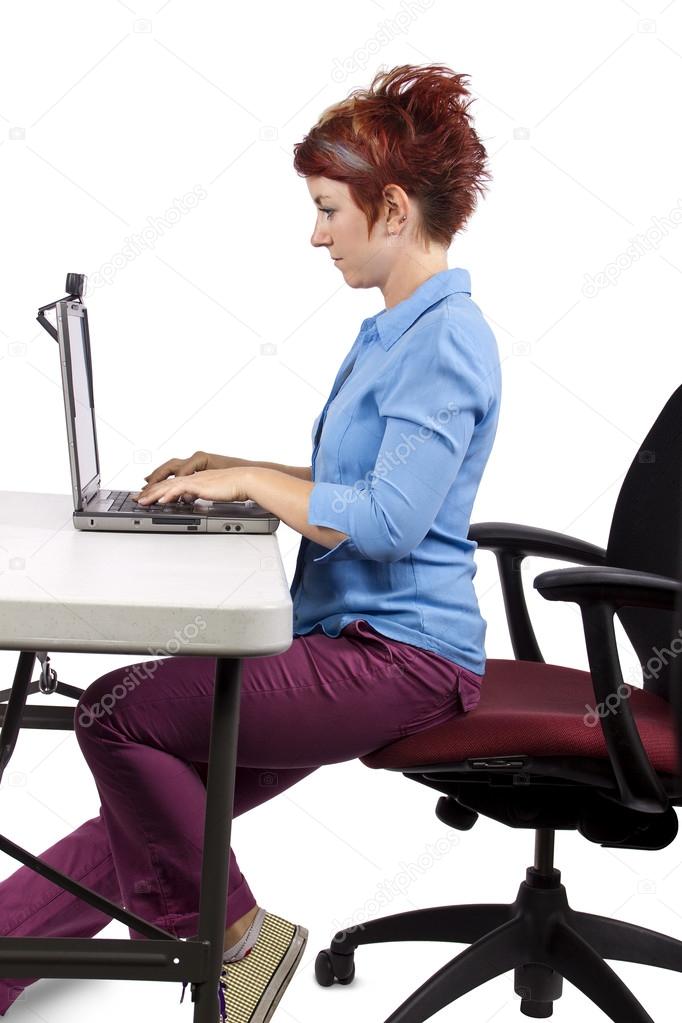 Woman demonstrating office desk posture