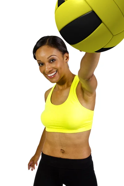 Female athlete with yellow volleyball — Stock Photo, Image