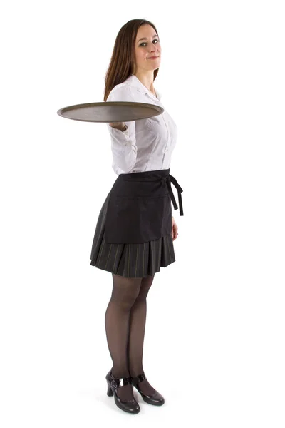 Jonge vrouwelijke serveerster bedrijf leeg — Stockfoto